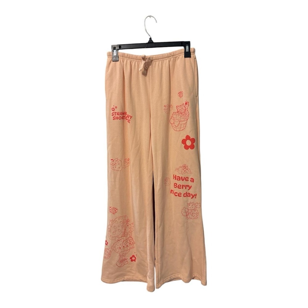 Strawberry shortcake Peach & red sweatpants with red floral and text graphics